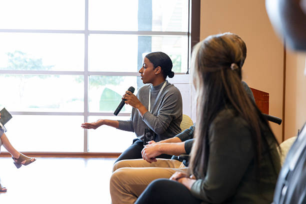 Facilitator speaking with students during a respect program session